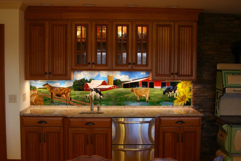 Stained glass mosaic backsplash installed in a dairy farm in Pennsylvania.  Design inspired by images of client's barn, property, and prized cows.